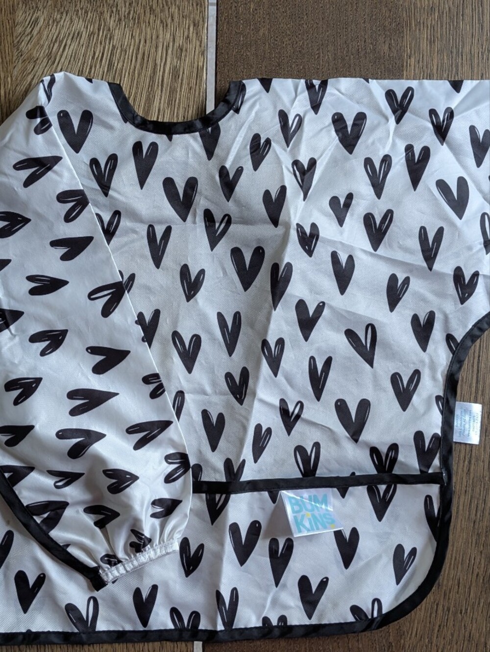 Bumkins White Bib Smock with Black Heart Print